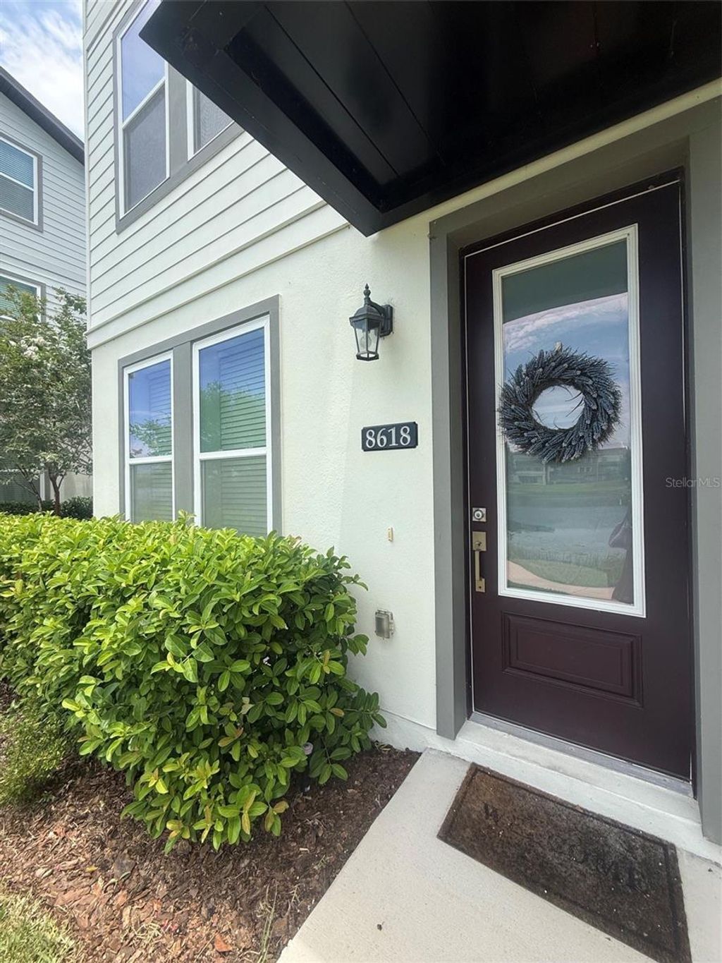 Photo of 8618 Warburg Alley, Orlando, FL 32827 (MLS # O6422499)