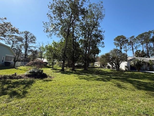 Photo of 22 Pythian Place, Palm Coast, FL 32164 (MLS # FC319159)