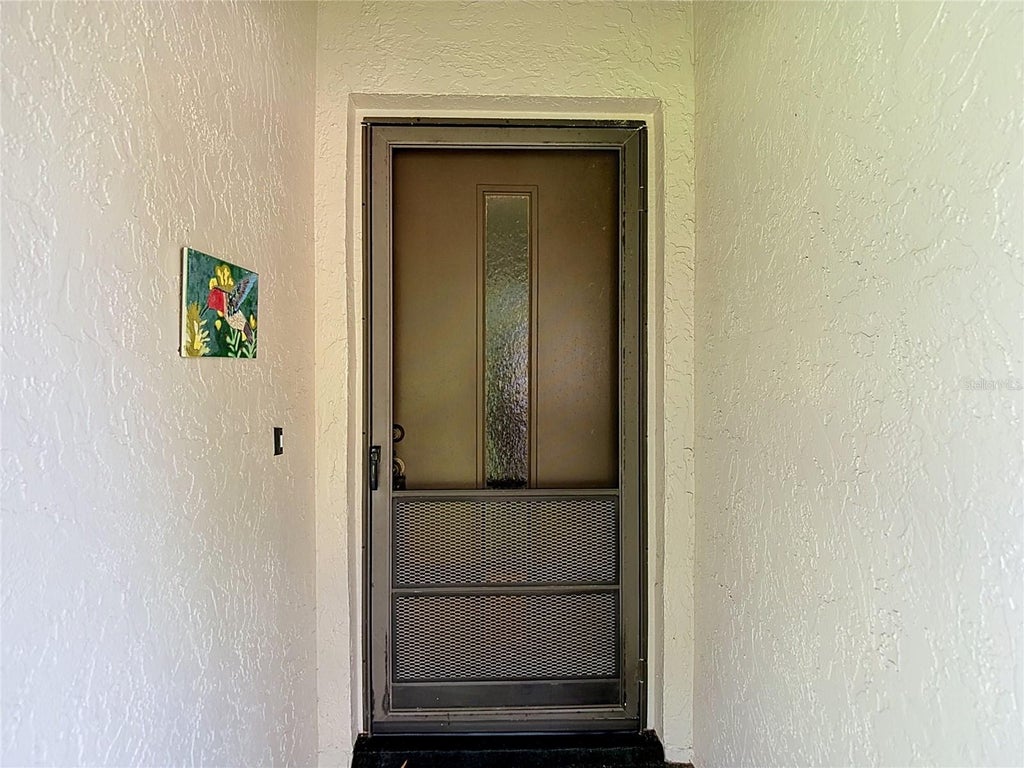 Photo of 13010 Wedgewood Way #C, Hudson, FL 34667 (MLS # TB8530424)