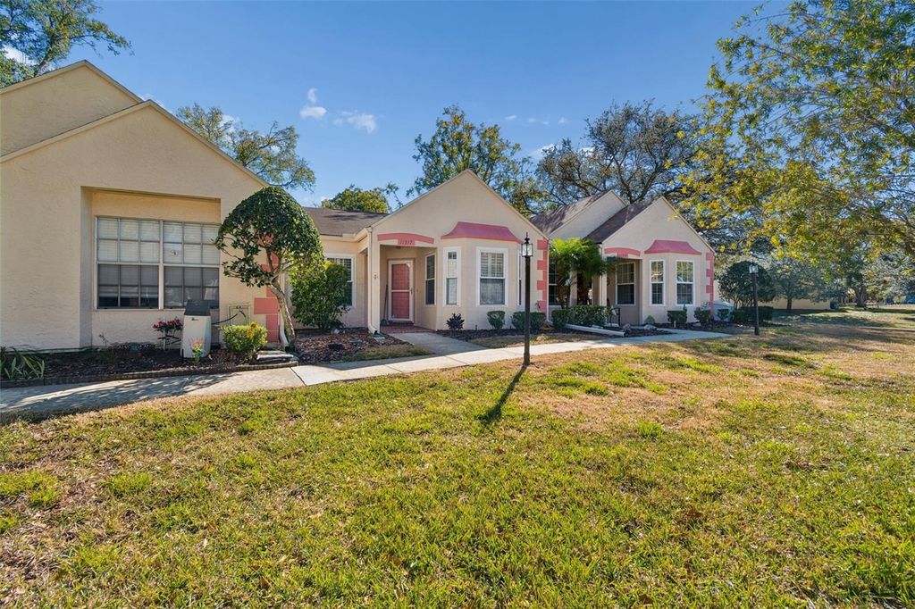 Photo of 11317 Versailles Lane #5, Port Richey, FL 34668 (MLS # TB8474251)