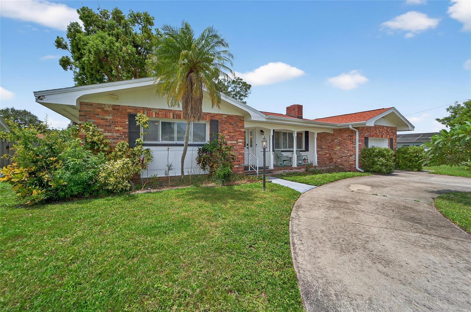 This charming home was built in 1963 and is located only minutes from the area’s beautiful beaches!! It sits on a nice sized lot with mature landscaping and beautiful trees. Inside you’ll find an open floor plan, great for entertaining, and upgraded features such as plantation shutters in the front windows of the home, wood look vinyl flooring, built in shelves in the dining room, and stainless steel appliances in the kitchen. It has 2 bedrooms, 2 full baths, and an additional room that can be used as an office or third bedroom if needed. You also have a large bonus room across the back of the home with so many possibilities for its use. Outdoors you'll find both a front porch and a screened back porch, perfect places for relaxing with your morning coffee. This home has a great location close to shops, restaurants, the local hospital, and the Pinellas Trail. Stop in today!