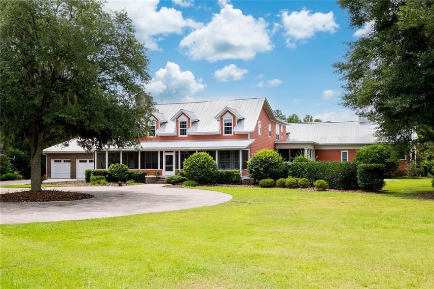 Under contract-accepting backup offers. This gorgeous estate is situated on over 67 acres less than 30 minutes from Gainesville! The gated entry leads you down the tree & lamp post lined road up to the main home and its circle driveway. The main home boasts almost 7,000sf with 7 bedrooms, 5.5 bathrooms, loads of upgrades throughout, multiple screened patios overlooking the serene property as well as a 2 car garage. Behind the home is a fresh water pond perfect for taking a dip or just relaxing by! The home pond flows into a larger nearby pond that features a dock with circulation, stocked w/fish and the pond is used for irrigation. Behind the home pond is a cabana with outdoor fireplace and "Pool House" perfect as a guest house or detached office/fitness center, equipped with a full bathroom. A separate structure coined "The Treehouse" is situated away from the main home and boasts a living room, full kitchen, washer/dryer, two bedrooms and two bathrooms and the ultimate privacy! In addition to these structures, the property also boasts 2 large pole barns, 1 horse barn with fenced paddock, tack barn, large workshop with electricity and water and a "Bunker" with a new AC unit and spray foam insulation (perfect for a cooled workshop or storage). This magical property offers planted pecan trees that are mature enough to produce pecans annually and also offer a beautiful landscape as you stroll through the property.