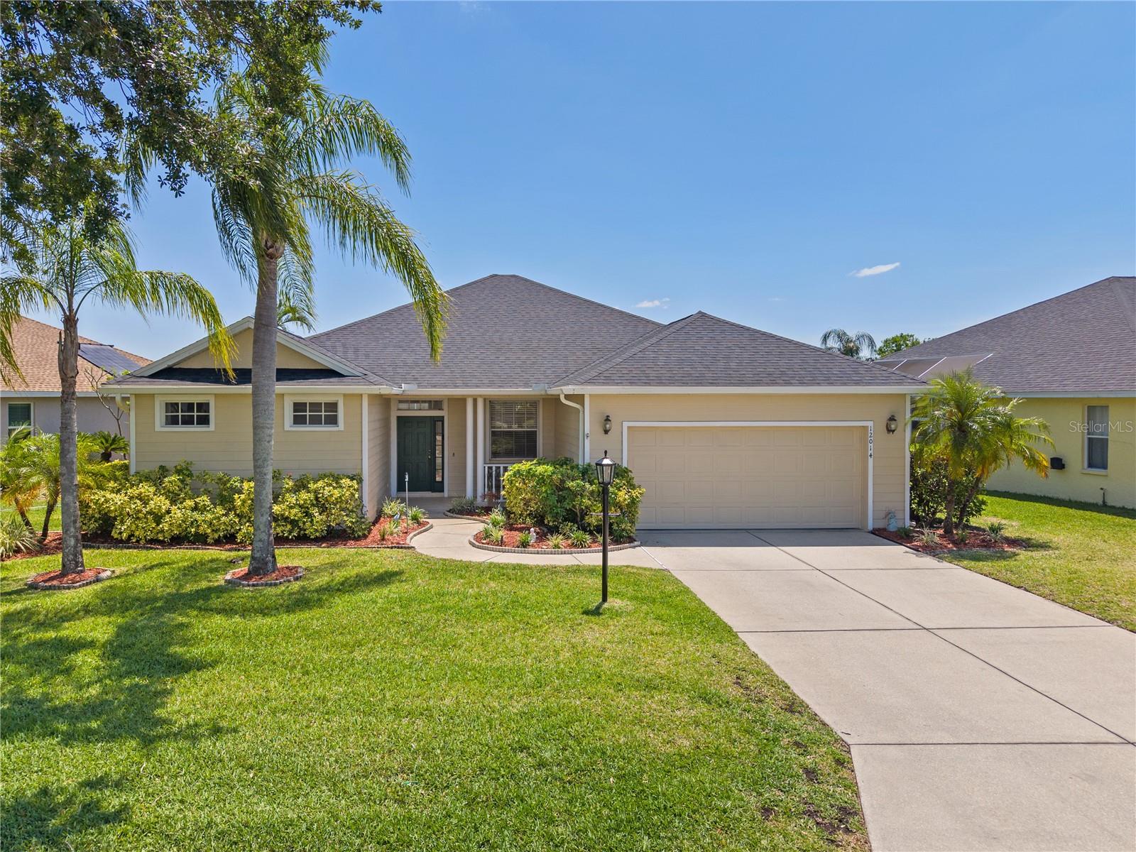 Discover your dream home in the picturesque Summerfield neighborhood of Lakewood Ranch! This remarkable three-bedroom, two-bathroom pool home offers a generous and inviting layout that truly reflects the vibrant Florida lifestyle. As you enter, your gaze is immediately drawn to the stunning pool, promising countless sunny days of relaxation and enjoyment. The heart of the home is a beautifully updated kitchen featuring a spacious breakfast bar, modern gas range, elegant granite countertops, and ample cabinet space—perfect for culinary enthusiasts. Experience seamless indoor-outdoor living with sliding doors that connect both the formal living room and family room to your newly screened lanai (completed in 2024). Imagine unwinding in the covered seating area, where you can soak in breathtaking views of the lake and witness stunning Florida sunsets. The patio beyond provides additional opportunities for gardening or grilling—ideal for entertaining friends and family. Designed for privacy, the split floor plan includes a lavish primary suite complete with classic tile floors, direct pool access through its own set of patio doors, a sizable walk-in closet, and a luxurious ensuite bathroom that boasts newer lighting, a walk-in shower, dual vanities, and a water closet. Two additional bedrooms, also featuring tile flooring, share a well-appointed full bathroom with a tub. Recent updates, including a brand-new air conditioner (2025) and a roof replacement (2021), ensure peace of mind, with all major upgrades meticulously taken care of. Positioned just moments from Summerfield Community Park, Main Street Lakewood Ranch, A-rated schools, and a variety of shopping and dining options, this home offers the perfect blend of convenience and lifestyle.
