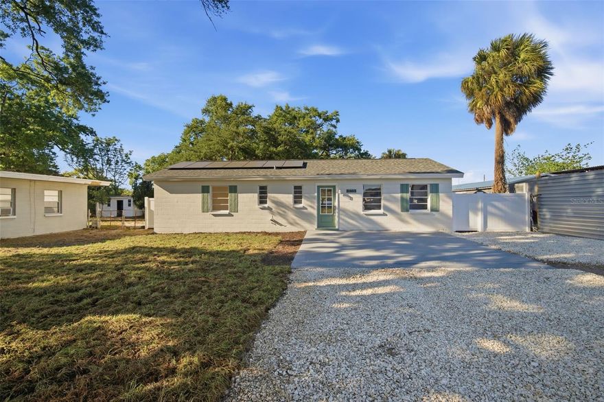 Welcome to your dream home—where modern design meets everyday comfort in the heart of Tampa. This beautifully renovated 3-bedroom, 2-bath residence offers a seamless open-concept floor plan, perfect for both entertaining and relaxed living. Step inside to discover a thoughtfully reimagined interior featuring designer-inspired finishes throughout, including stunning, spa-like bathrooms and a stylish, modern kitchen that blends form and function effortlessly. Major upgrades provide peace of mind with a brand-new AC system, updated electrical, paid off solar panels, and quality craftsmanship at every turn. Out back, escape to your own private oasis. The fully fenced yard offers both privacy and tranquility, complete with a dedicated entertainment space—ideal for hosting gatherings, enjoying Florida evenings, or creating lasting memories with family and friends. Conveniently located just minutes from premier shopping, vibrant downtown life, and MacDill Air Force Base, this home combines luxury, location, and lifestyle in one exceptional package. Don’t miss your opportunity to own this move-in-ready gem in one of Tampa’s most desirable areas. Don't delay. Schedule a tour today!