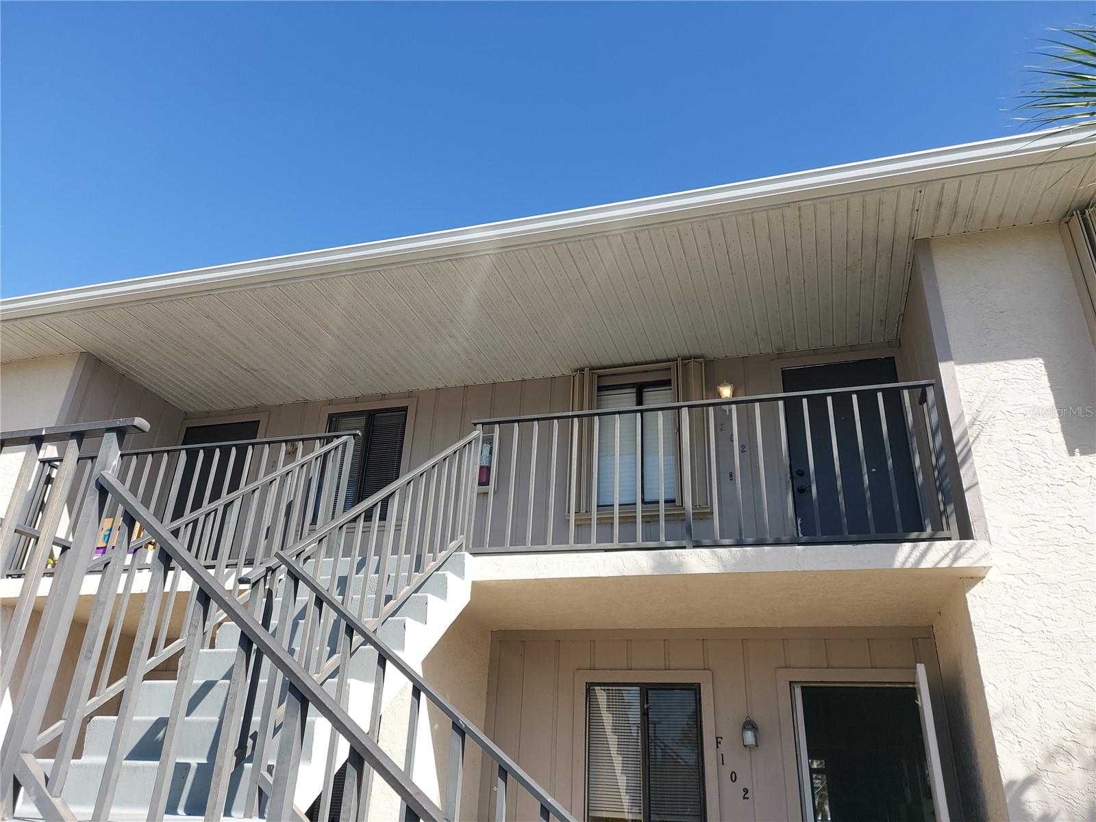 RENT INCLUDEDS WATER, TRASH, SEWER and POOL. Second floor, spacious open floor plan condo. No elevator access. Contacts for movers available. Many recent updates include NEW appliances, GRANITE counter tops in the kitchen and baths, fresh paint, and tile throughout. The master bedroom has a large walk-in closet and private bath with NEW toilet and walk-in shower. WASHER AND DRYER are private in unit. Enjoy the outdoors on your screened in balcony off the rear of the unit. Pool and lounge area is available at the clubhouse, right outside your front door! Woodsonia requires a minimum 600 credit score, minimum income of $2500 monthly net, and a background check. NO EXCEPTIONS. Block building, with NEW ROOF and HURRICANE SHUTTERS. *Small cat accepted*