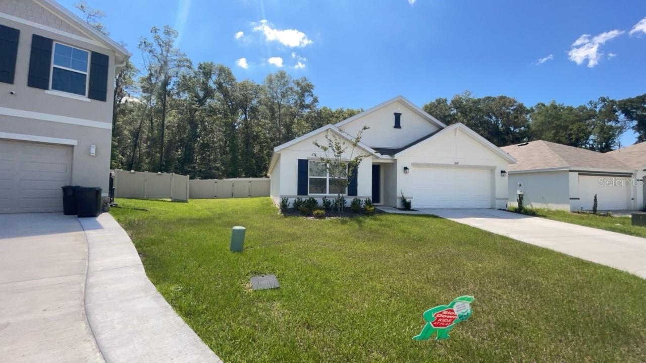 Experience modern living in this stylish 4-bedroom, 2-bath home nestled in a quiet SE Ocala neighborhood. With over 1,820 square feet of open living space, this thoughtfully designed home features sleek tile flooring throughout, stainless steel appliances, and an attached two-car garage offering both comfort and functionality.
Enjoy elevated touches like custom window treatments and a beautifully maintained yard perfect for relaxing evenings or weekend gatherings. The spacious layout and clean, contemporary finishes make this the ideal place to call home.