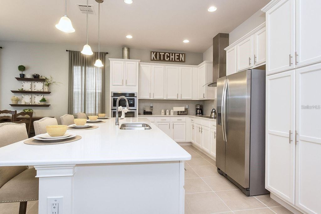 Photo of 7736 Linkside Loop, Kissimmee, FL 34747 (MLS # O6396685)