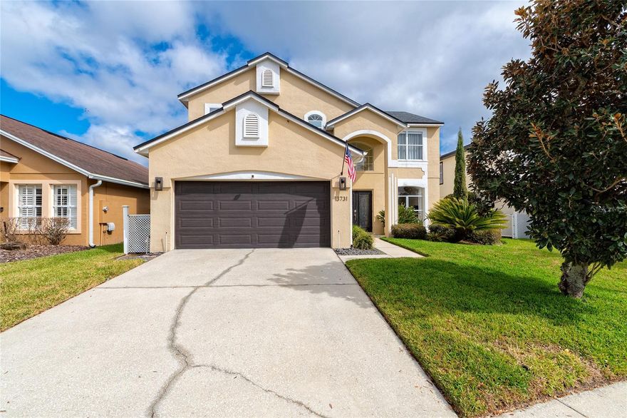 Welcome to 13731 Waterhouse Way!  A Stunning Waterfront Pool Residence in Eastwood. Located in the highly sought-after Eastwood community in East Orlando, this exceptional waterfront pool home offers four bedrooms, two and a half bathrooms, and over 2,500 square feet of well-designed living space. The property is ideally situated just minutes from Waterford Lakes Town Center, shopping, dining, entertainment, and Orlando International Airport. From the moment you arrive, you are welcomed by serene panoramic views of an expansive pond with a fountain, visible from both inside the home and throughout the outdoor living areas. The oversized screened-in pool enclosure creates a private retreat, perfect for enjoying morning coffee or relaxing evenings while overlooking the peaceful waterfront setting. The outdoor living space is thoughtfully designed for both comfort and entertaining, featuring a covered patio with a ceiling fan and a summer kitchen with a built-in gas grill, marble countertop, and custom cabinetry. Beautiful landscaping enhances the home’s curb appeal and overall ambiance. Inside, the kitchen combines functionality and elegance, offering a gas cooktop, built-in oven, stainless steel appliances, quartz countertops, and floor-to-ceiling cabinetry that provides abundant storage. The main living areas showcase oversized ceramic tile flooring, while the second floor features luxury vinyl plank, creating a cohesive and modern aesthetic throughout the home. An electric fireplace in the living room adds warmth and charm during cooler evenings. Upstairs, the spacious primary suite includes a walk-in closet with custom built-ins and a well-appointed en-suite bathroom featuring dual vanities with quartz countertops, ample cabinetry, a frameless glass shower, and a relaxing soaking tub. Additional features include a large-capacity washer and dryer with custom laundry cabinetry, a whole-house water filtration system, a salt-free water softener, and a pool heater to extend the swimming season year-round. Large windows throughout the home allow for abundant natural light, enhancing the open and inviting atmosphere. This remarkable property seamlessly blends modern elegance, comfort, and a functional floor plan in one of East Orlando’s most desirable communities. Schedule your private showing today. Property is being sold As-Is.