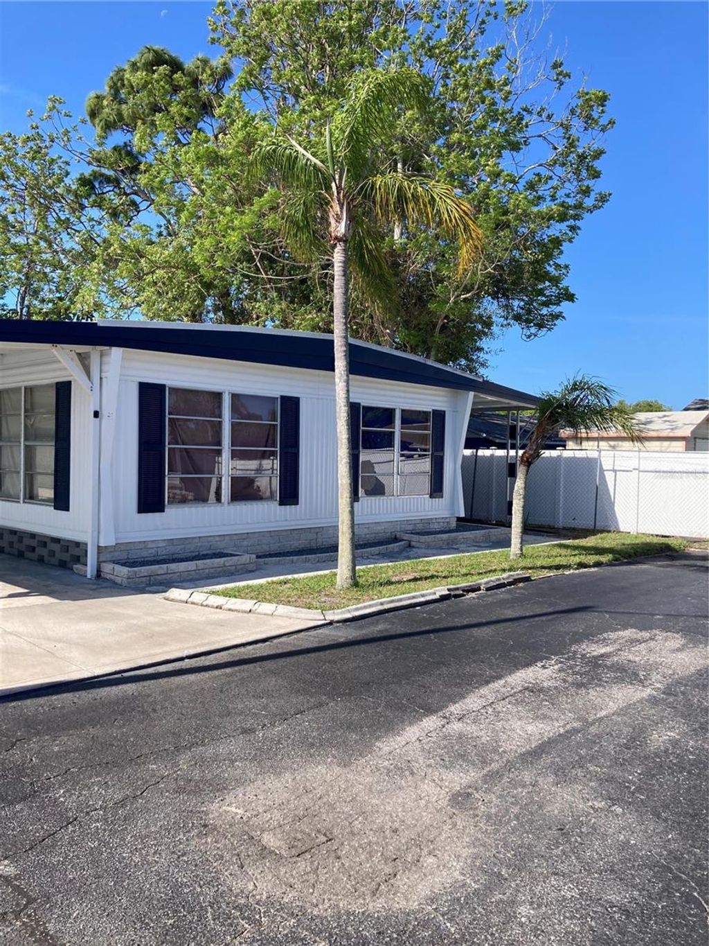 Photo of 3212 W Tiki Drive, Holiday, FL 34691 (MLS # TB8496586)