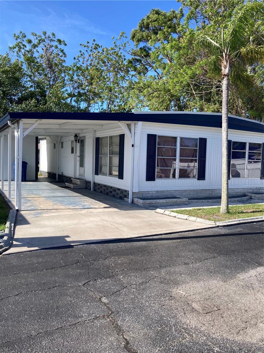 Photo of 3212 W Tiki Drive, Holiday, FL 34691 (MLS # TB8496586)