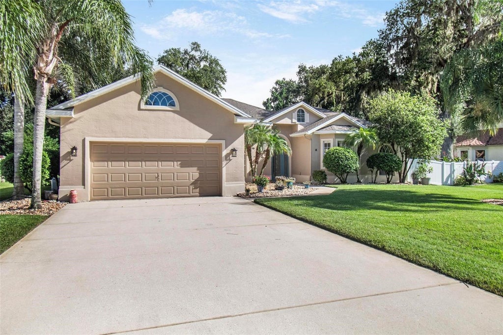 Photo of 8 River Oaks Way, Palm Coast, FL 32137 (MLS # FC321509)