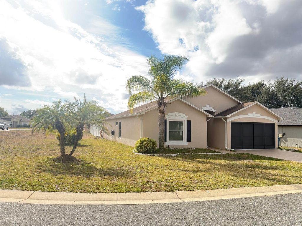 Photo of 730 Garberia Drive, Davenport, FL 33837 (MLS # O6425007)