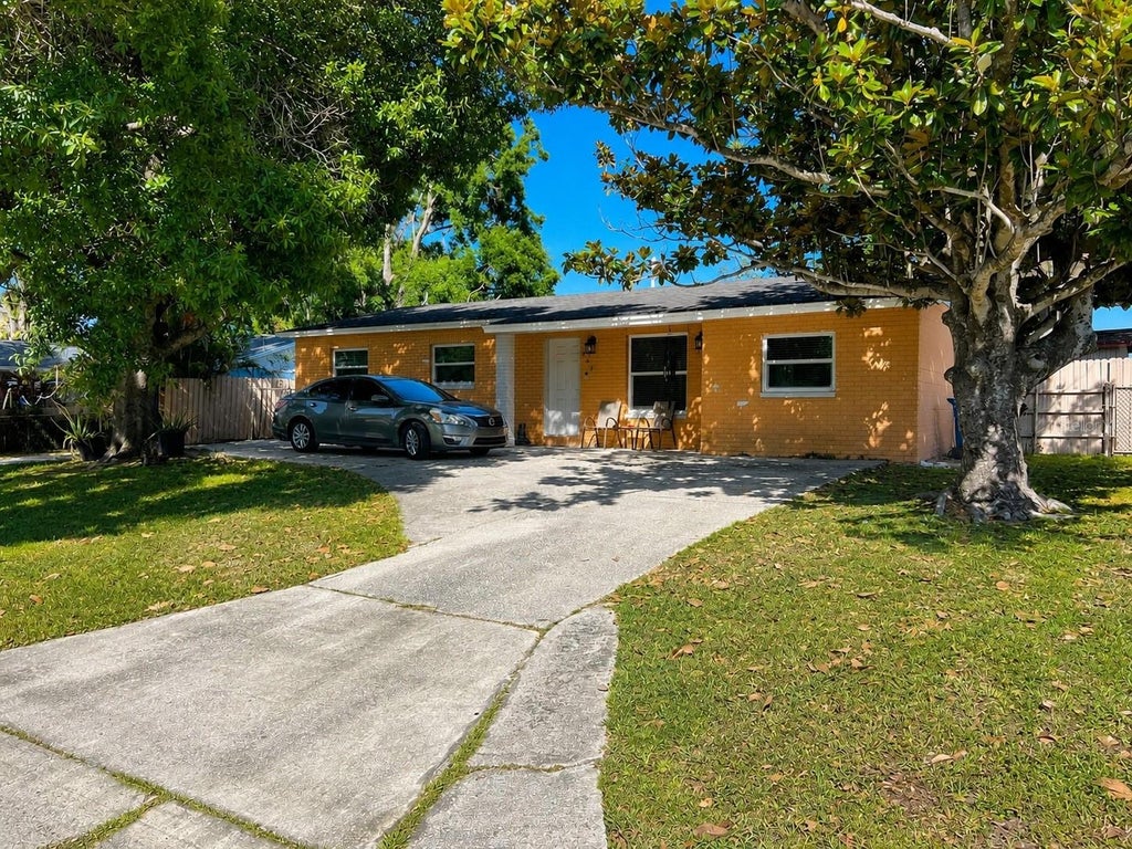 Photo of 802 Papaya Drive, Tampa, FL 33619 (MLS # TB8545617)