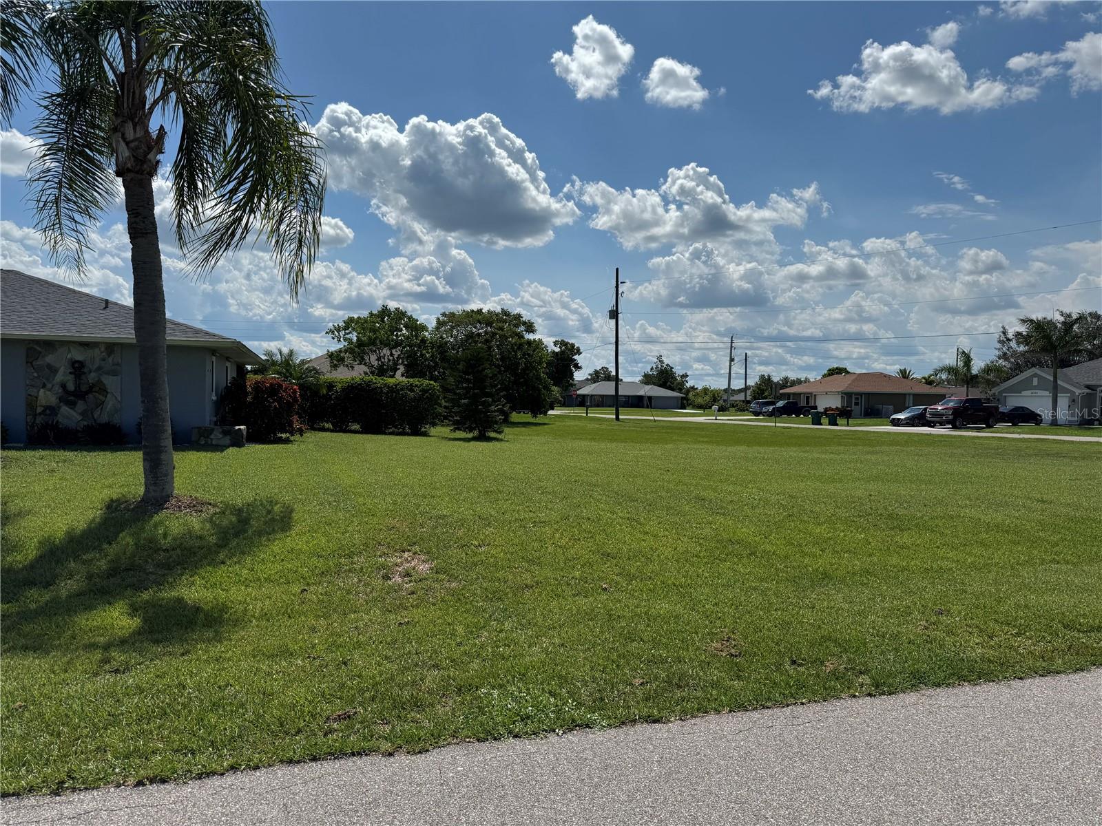 Beautiful Residential Lot located in the highly sought-after community of Deep Creek, Section 20—a deed-restricted neighborhood known for its well-maintained homes and peaceful atmosphere. This buildable lot is situated in Flood Zone X (no flood insurance required) and offers public water and sewer, making it the perfect spot to build your Florida dream home.
Enjoy the convenience of being just minutes from Deep Creek Golf Club, tennis and pickleball courts, walking trails, and neighborhood parks. The lot is ideally positioned near shopping, dining, medical facilities, and entertainment, with easy access to I-75 for quick commutes north to Sarasota or south to Fort Myers. You’re also just a short drive from Charlotte Harbor, boat ramps, Gulf beaches, and the vibrant waterfront scene in historic downtown Punta Gorda.
26315 Argentina Dr is nestled on a quiet, established street with attractive neighboring homes—don’t miss this opportunity to secure your place in one of Punta Gorda’s most desirable areas!