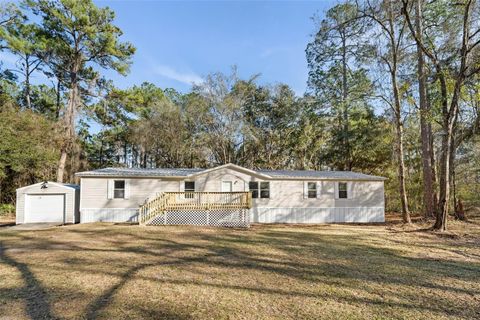 Photo of 11919 NW 23rd Drive, Gainesville, FL 32609 (MLS # OM717532)