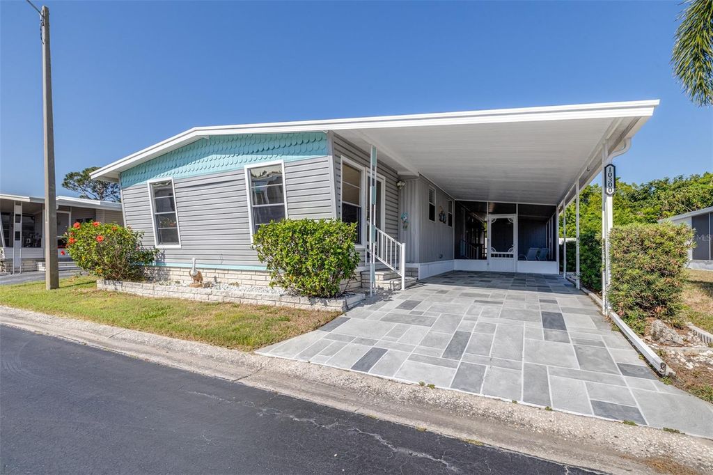 Photo of 10300 Holiday Lane #361, Largo, FL 33773 (MLS # TB8377295)