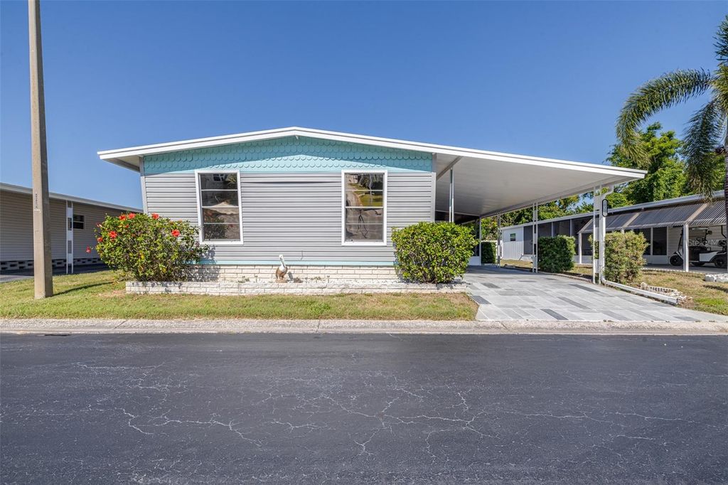 Photo of 10300 Holiday Lane #361, Largo, FL 33773 (MLS # TB8377295)