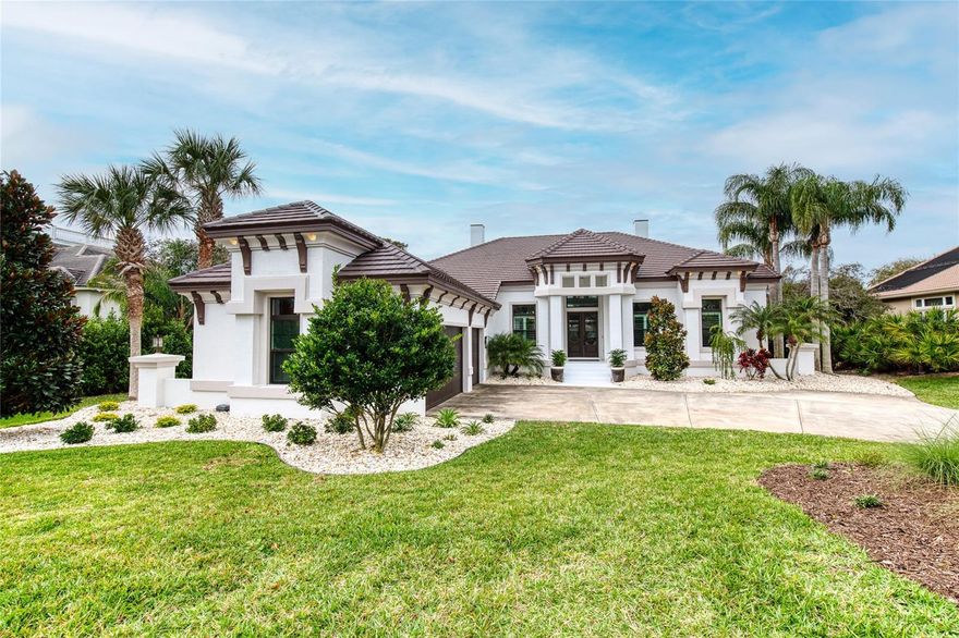 Absolutely breathtaking pool home estate on the Intracoastal Waterway in highly sought-after Island Estates of Hammock Dunes! This one of a kind property has just been completely remodeled from top to bottom with nothing but the most high-end finishes and features expected by todays luxury homeowner. Enter to a warm and welcoming open floor plan with tons of natural light and expansive views across the estate out to the Matanzas River. The living room, kitchen, and dining room all flow seamlessly offering an entertainers dream layout with exceptional access between indoor and outdoor spaces. The 12ft ceilings throughout the home give a feeling of grandeur while each hand-picked fan, light, and fixture shows the care taken to professionally decorate and finish each space. In the living room, a floor-to-ceiling tile accent wall is home to a modern color changing fireplace below an inset 85-inch TV. The centerpiece of the home is certainly the chefs kitchen complete with custom quartzite counters and backsplash, gas range, wine fridge, beverage cooler, icemaker, wetbar, eat-up island, and a tremendous amount of custom cabinetry. The primary suite located on the first floor has river views, pool access, fireplace, twin walk-in closets, ensuite bath with a stunning walk-in shower and garden tub. The split floor plan features two additional guest rooms on the south wing of the home, one with an ensuite bathroom that doubles as a pool bath. The 2nd story features an in-law suite with kitchenette, living room with fireplace, balcony, and full bedroom and bathroom. The oversized 3-car garage a car lovers dream come true with high ceilings that allow for a 2-car lift giving space for 5 VEHICLES plus extra storage! (current lift is negotiable) But wait, there's more outside! Complementing the exquisite interior of this home, the screened lanai is an oasis for relaxing and entertaining. The infinity pool has a heated spa, gas fire bowls, travertine deck, and custom screen enclosure that specifically does not impede the view of the lush backyard and river. The outdoor entertaining area has a full summer kitchen complete with grill, gas fireplace, TV, fridge, and outdoor shower. The dock has a covered boat lift with all new cables and hoists, two full waverunner lifts, covered sitting area, and stairs down to the waters edge. Island Estates is an exclusive gated community with full time security, private beach access, and is part of Hammock Dunes which has a private Tom Fazio links golf course, Rees Jones Creek Course, clubhouse, and much more. Owners will consider selling furnished. Bedroom Closet Type: Walk-in Closet (Primary Bedroom).