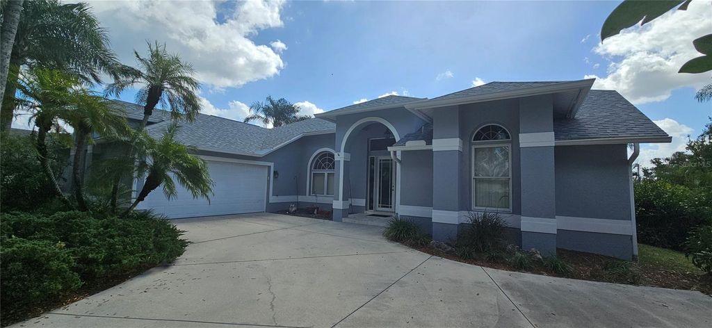 Photo of 11729 Timberline Circle, Fort Myers, FL 33966 (MLS # C7518697)
