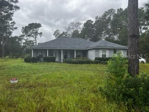 Photo of 7492 Monongahela Avenue, Keystone Heights, FL 32656 (MLS # A4709106)