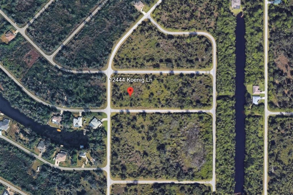 Photo of 12444 Koenig Lane, Port Charlotte, FL 33953 (MLS # C7520371)