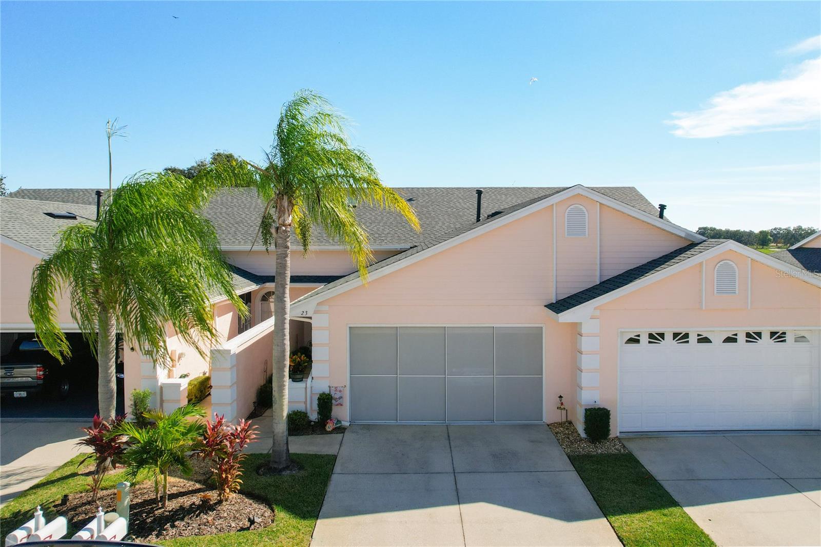 SELLER MOTIVATED! Price reduction! Impeccable villa in Cypresswood with Modern Upgrades! This pristine 2-bedroom, 2-bathroom unit is situated within the gated community of Cypresswood, offering a range of amenities associated with this well-established golf course neighborhood. The open floor plan creates an inviting, spacious atmosphere, and the generously sized kitchen boasts new granite countertops, modern stainless steel appliances, and ample counter space. The interior has been tastefully upgraded with Pergo hardwood flooring, new ceiling fans, and contemporary light fixtures. The entire home has been freshly painted, providing a clean and inviting atmosphere. The roof was recently replaced in 2023, ensuring peace of mind for years to come, and the A/C unit was replaced in 2020 for enhanced efficiency and comfort. The master suite features a walk-in closet, a garden tub, a separate shower, and dual sinks. There is also a glassed-in lanai, perfect for relaxing with a good book or extending your living space when entertaining. The spacious two-car garage with retractable screen door can serve as a workshop or golf cart storage if you have only one vehicle. The community offers a host of amenities, including a golf course, a clubhouse, tennis courts, a club pool, and a 24-hour guard at the entrance gate. Don't miss this opportunity to own an immaculate villa in this fantastic community! The $429 HOA fee encompasses a comprehensive array of services. All exterior maintenance is included in the fee including the upkeep of the grounds, meticulous yard maintenance, expert mowing and vegetation trimming, as well as the professional painting of your home's exterior and roof replacement as required, pressure washing the exteriors, driveways and walks every 12 to 18 months. The dues also cover replacing the roads every 10 years. Cypresswood central location provides easy access to HWY-27, the charming town of Winter Haven, and both Orlando and Tampa, each just an hour away. Not to mention, you're only 1.5 hours from the stunning Florida coasts. Don't miss the opportunity to make this exceptional property your own.