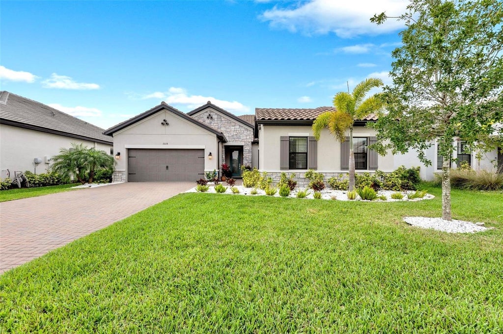 Photo of 2028 Woodleaf Hammock Court, Bradenton, FL 34211 (MLS # A4696734)