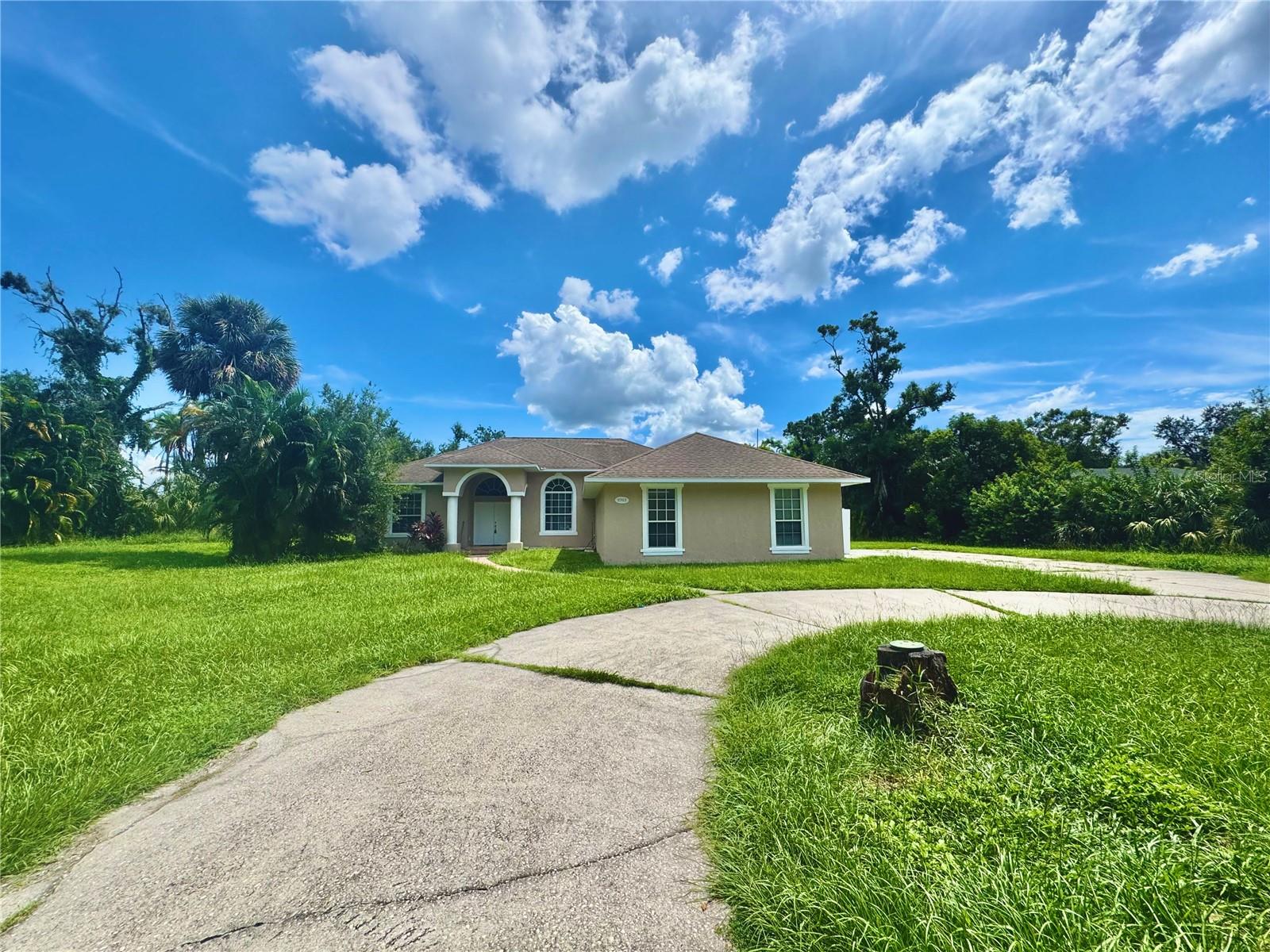 RARE SOUTH TAMPA RENTAL - Don’t miss this rare opportunity to lease a spacious 4 bedroom, 3 bathroom home on 1.63 ACRES in the heart of South Tampa. Located just minutes from MacDill Air Force Base and the iconic Bayshore Boulevard, this property offers unmatched space and privacy. Behind your own private gated entrance, you’ll find a beautifully maintained home featuring a bright open floor plan, brand new kitchen appliances, a formal dining room, a family room and kitchen combo, and a large screened-in patio overlooking the expansive grounds. The split-bedroom layout provides ultimate privacy, with the master suite tucked away in the back right corner featuring a garden tub, oversized walk-in shower, dual vanities, and direct patio access. Two bedrooms share a convenient Jack-and-Jill bathroom, while the fourth bedroom has its own private bath. Additional features include a 3-car garage, a private laundry room, and a fully fenced property. Vacant and ready for move-in, this home is available for a flexible lease term. Lawn service may be added for $200/month.