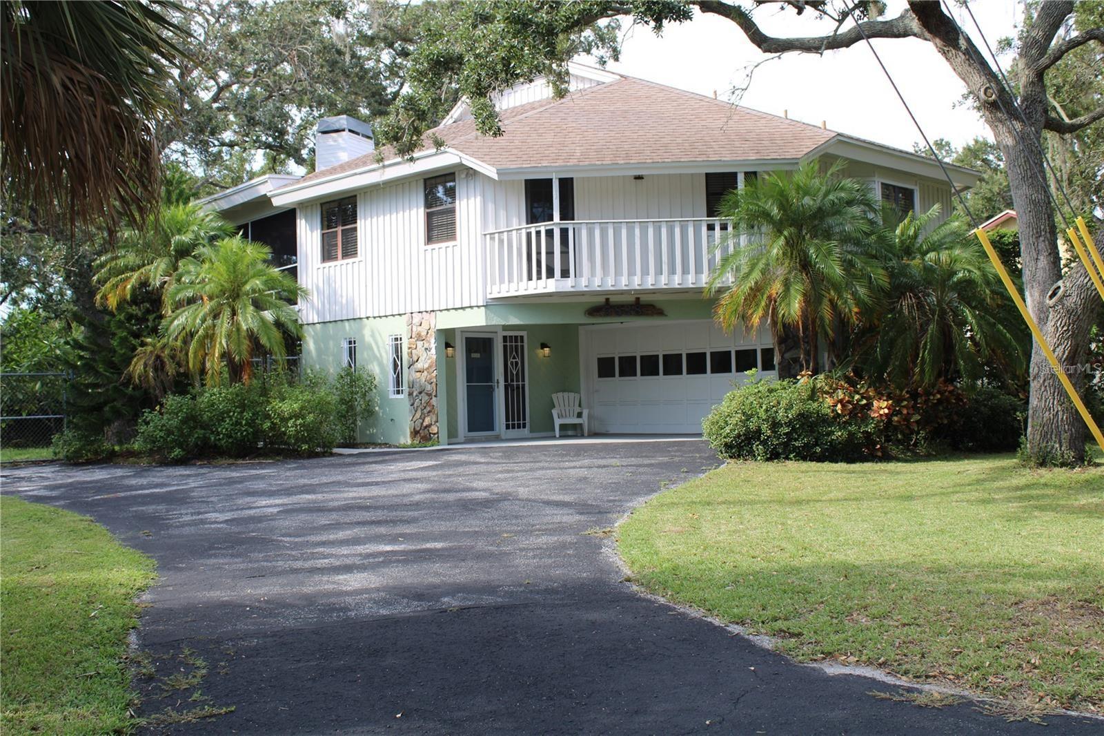VERY PRIVATE AND HAS ACCESS TO TIDAL WATER FOR CANOEING AND KAYAKING. 7 MINUTES TO THE BEACH AND 5 MINUTES TO BOAT RAMP. 3 BEDROOMS, 3 BATHS, 2 CAR GARAGE, ELEVATOR. LIVING AREA ON BOTH FLOORS. CERAMIC FLOOR DOWNSTAIRS AND HARDWOOD FLOOR UPSTAIRS. BOAT ACCESS. CLOSE TO ALL SHOPPINGS, RESTAURANTS. THE QUIET NEIGHBORHOOD. A MUST SEE TO BELIEVE.