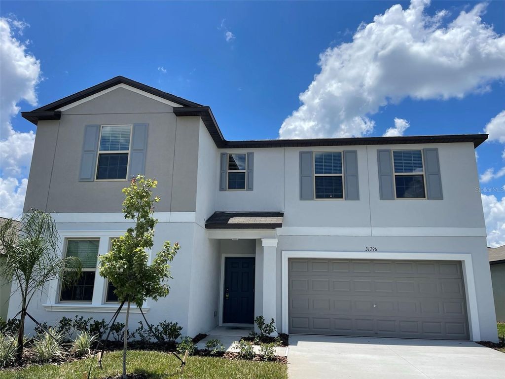 Photo of 31796 Sun Kettle Loop, Wesley Chapel, FL 33545 (MLS # TB8465784)