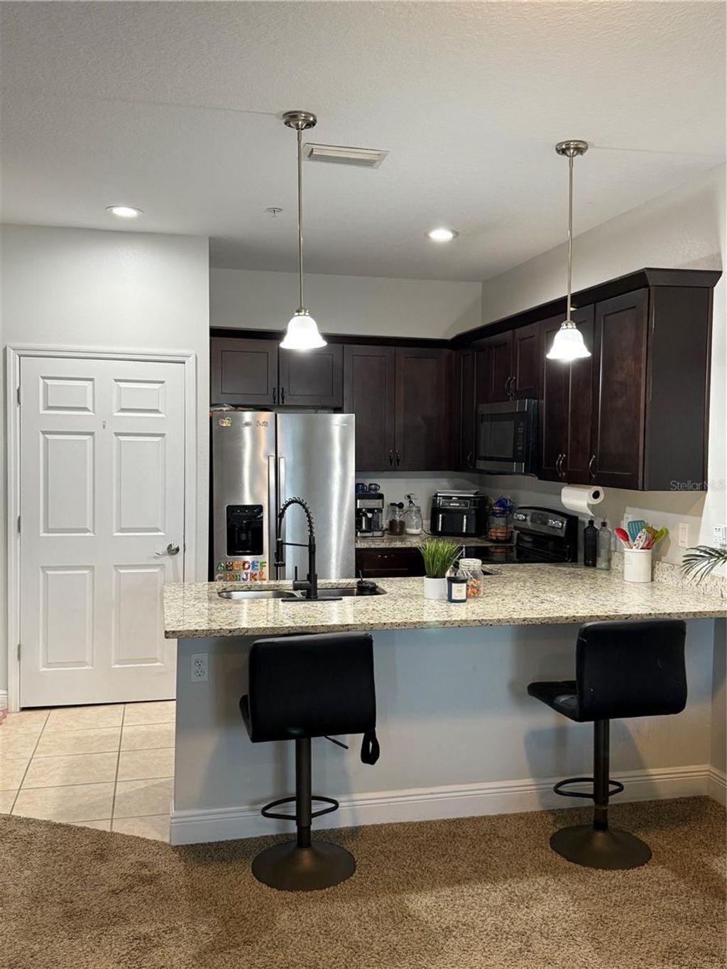 Photo of 1599 Cumin Drive #1599, Kissimmee, FL 34759 (MLS # S5137392)