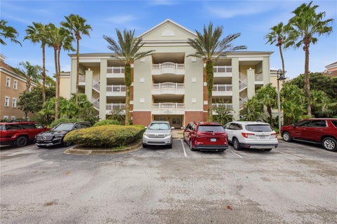 Photo of 7660 Whisper Way #402, Reunion, FL 34747 (MLS # S5158984)