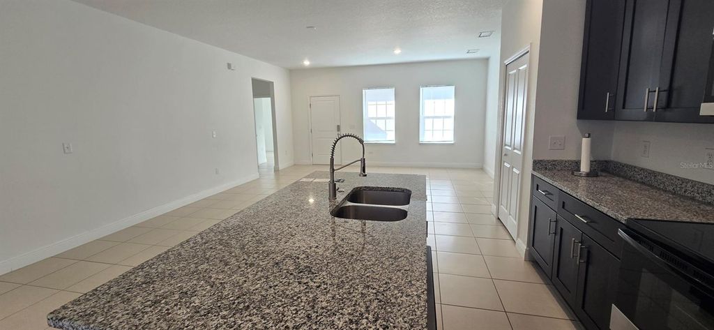 Photo of 405 Marion Oaks Lane, Ocala, FL 34473 (MLS # OM717144)