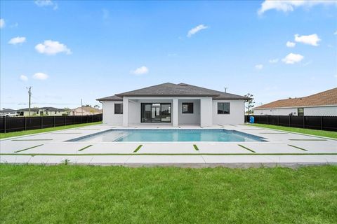 Photo of 1925 NW 15th Terrace, Cape Coral, FL 33993 (MLS # A4692530)