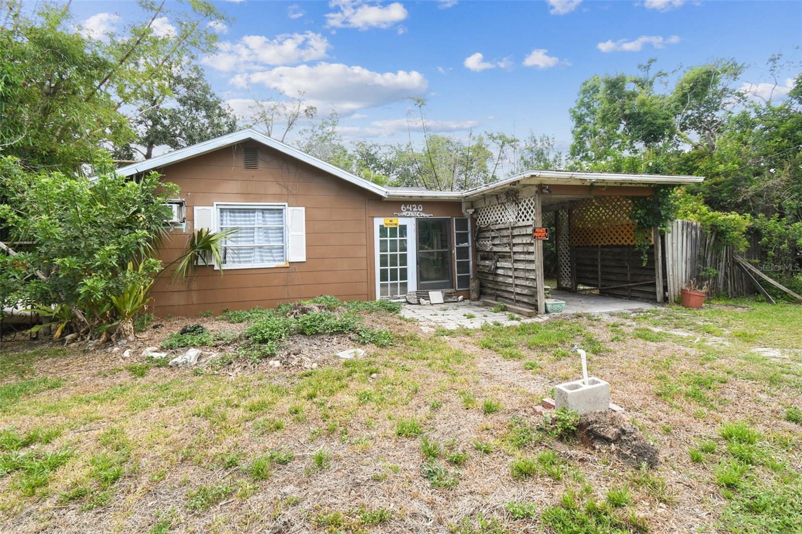 Create your own private oasis! This parcel of land has so much to offer. Rehab the three multi family dwellings on site or remove to build your dream home. Includes addresses, 6420, 6426, and 6428 Oelsner St. Close to historic downtown New Port Richey and minutes from the water to enjoy the Gulf of Mexico. Golf cart friendly, easy to access nearby roads and amenities, within walking distance to the beach. Nestled in a peaceful setting, the property features a pond, ideal for fishing, wildlife viewing, or simply relaxing by the water. This unique property offers endless possibilities so book your appointment today.