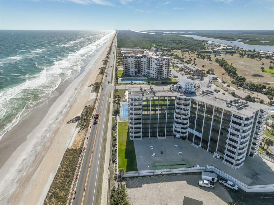 Have you been dreaming about a beachfront condo with panoramic views? For the MOST UNOBSTRUCTED and EXPANSIVE condo VIEWS in Flagler Beach, look no further! This top floor penthouse at the Nautilus is the epitome of "location, location"! No neighbors above you.  9th Floor views out to lovely Flagler Beach (Flagler has a 3 floor building limit, so the view goes on forever)  the Intracoastal waterway to the West and  North and an expansive view of the Atlantic Ocean to the East. The veranda wraps around and there’s a view from every room too. It’s breathtaking. Imagine watching the sunrise and the sunset? Always a treat from this unit!
The layout of this unit is just right too. Open kitchen takes advantage of the views. Living Room with surround Sound system. Master Bedroom is set far from the main living area, so it is extremely quiet, even when there is activity. Walk thru the unit with our 3D VIRTUAL TOUR
Additionally  features new AC in 2024 and new  in 2025 luxury vinyl flooring. Unit comes furnished and boasts a pool table and dining table that doubles as a card table, so bring your toothbrush and start enjoying Florida life.
Nautilus amenities include an oceanfront pool, fitness center, Tennis-pickleball courts, and a community room. Parking and storage is located under building.