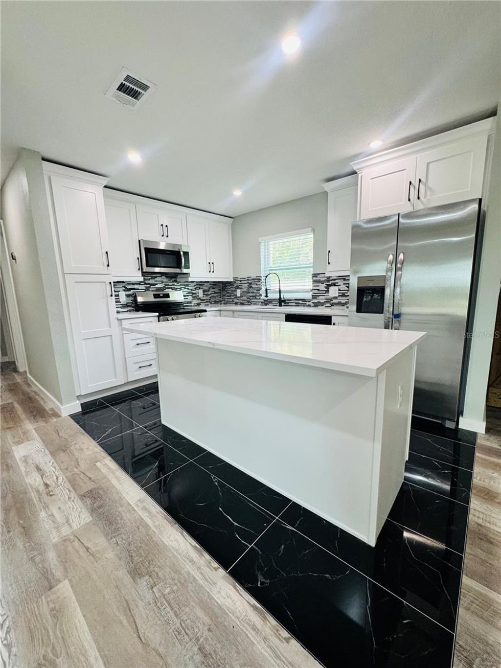 Photo of 7013 Symmes Road, Gibsonton, FL 33534 (MLS # A4658860)