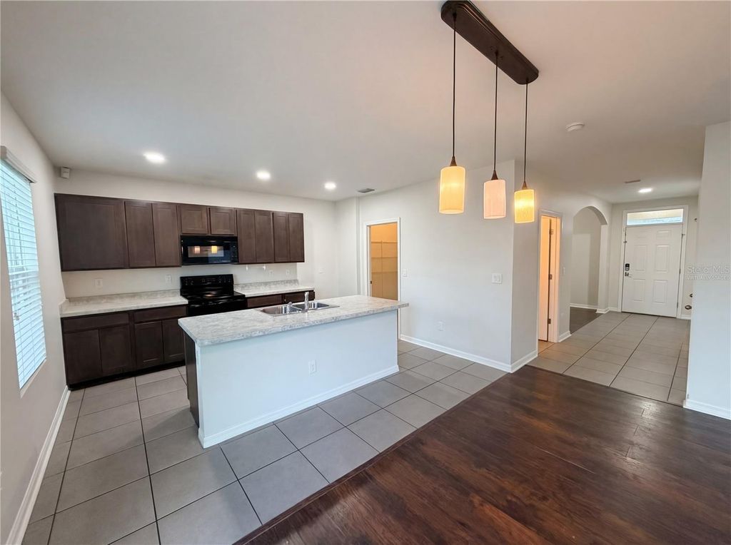 Photo of 35687 Hillbrook Avenue, Zephyrhills, FL 33541 (MLS # O6398474)