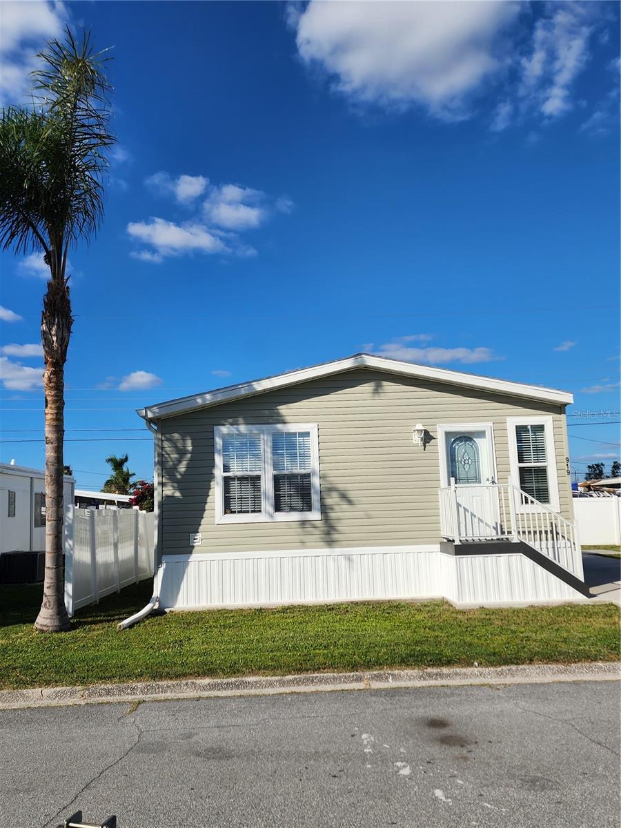 *** BIG PRICE REDUCTION *** Welcome home to your new 2024 Jacobson Home in a vibrant, active 55+ community. Fair Lane Acres is one of the few pet friendly, land owned communities waiting for you to move-in! This light, bright, and open floor plan is the perfect place to put your feet up and relax in the Florida Sunshine with all of the modern comforts of a top of the line manufactured home. Enjoy the great outdoors, while enjoying cards with friends in the clubhouse, relaxing at the pool, playing shuffle board or even a little pickel ball for fun! This new home has many additions giving it the added touches of crown molding, sheetrock in every inch of the home. Double sinks in the owners sweet and a full bathtub in the main bathroom. Extra cabinets, and storage... plus an inside laundry room! If you are ready to make this your next home, call for a private showing and lets make plans to start your move. All reasonable offers considered.