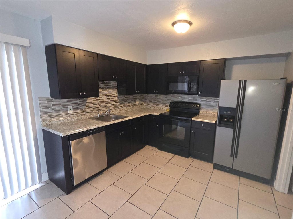 Photo of 4001 Woodfern Drive #C1, Orlando, FL 32839 (MLS # S5153904)