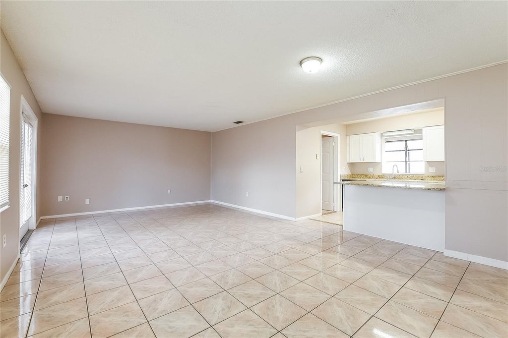 Photo of 6529 Precourt Drive, Orlando, FL 32809 (MLS # TB8538452)