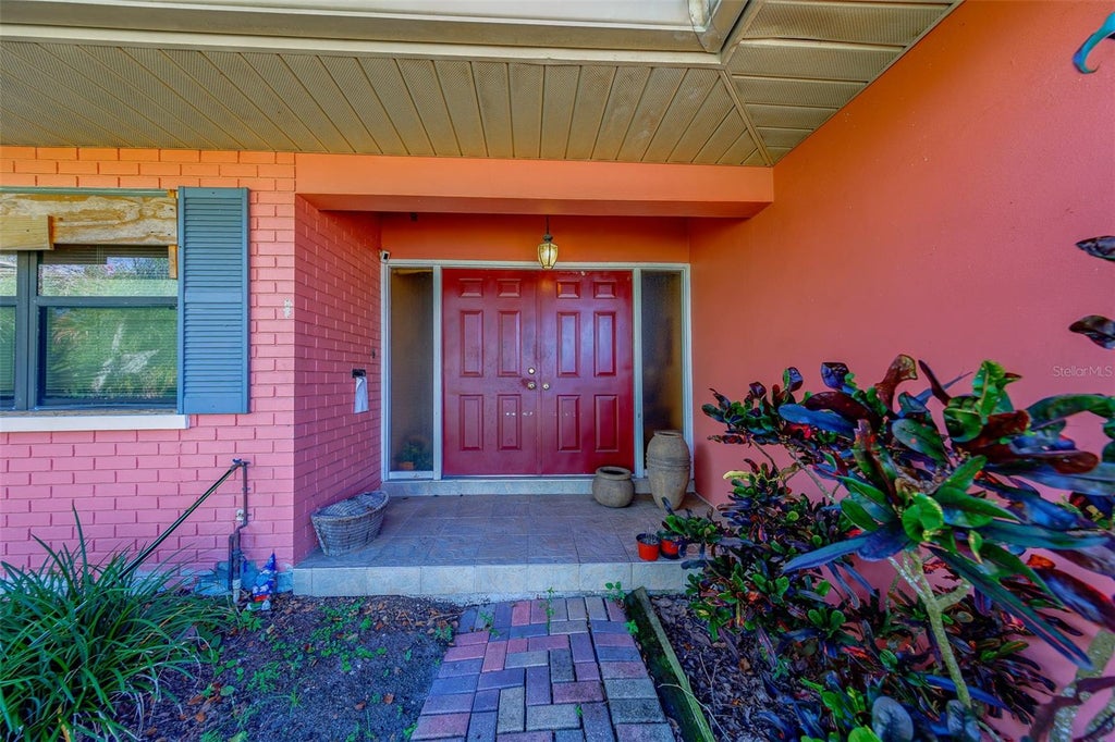 Photo of 1105 Woodcrest Avenue, Clearwater, FL 33756 (MLS # TB8548162)