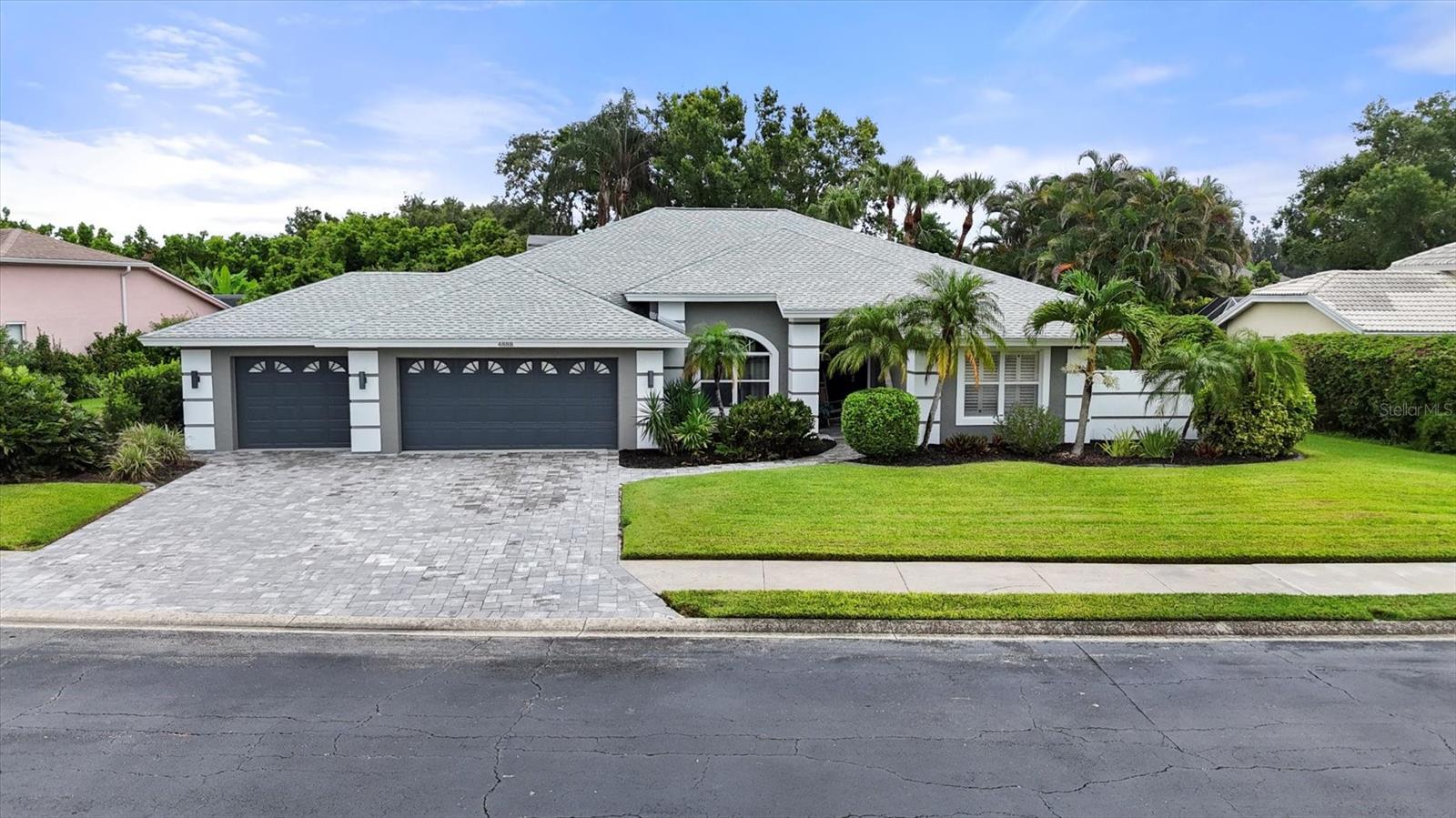 Welcome Home.... Beautiful 4 bedroom 3 1/2 bath ranch home with oversized 3 car garage. In highly desirable GATED Amberlea Subdivision.
This 3076 sq. ft. Ranch home is located in Sarasota's most sought after school district, Riverview High School, Sarasota Middle and Ashton Elementary all class A rated schools. Quality updates include: Paved 3 car driveway, Remodeled kitchen with newer stainless steel appliances, center island, and breakfast bar. All 3 baths recently remodeled with high end finishes (75,000), 2 new central air conditioning systems for the main living area (lots of cold air). Large 724 sq. ft. garage with own air condition system great for car enthusiast . Large master bedroom with its own seating area. Home has a great flow plan with master bedroom, living room, and family room all overlooking private back yard with mature landscaping. Oversized pool and spa area has screened in pool deck and covered lanai. A great place to enjoy your own backyard vacation. Amberlea is conveniently located just minutes from down town Sarasota, shopping, dining, Legacy trail, Siesta Key and easy access to I-75. Make this lovely home yours today.