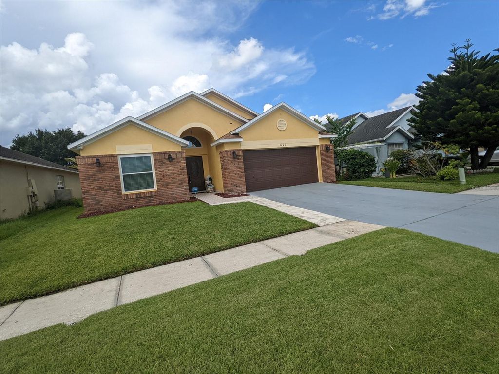 Photo of 1729 Snaresbrook Way, Orlando, FL 32837 (MLS # O6371321)