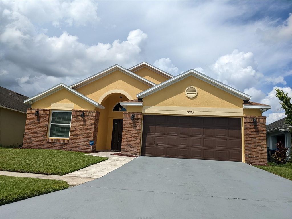 Photo of 1729 Snaresbrook Way, Orlando, FL 32837 (MLS # O6371321)