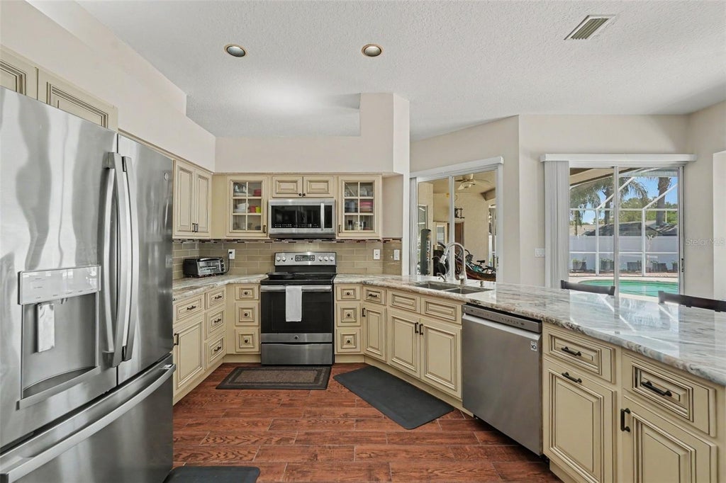 Photo of 12410 Driftstone Way, Riverview, FL 33569 (MLS # TB8541464)
