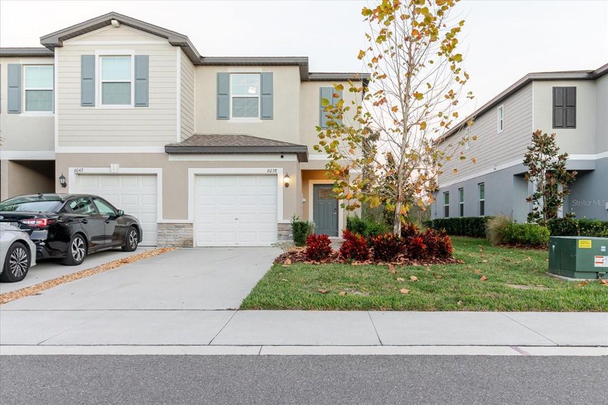 Come check out this 2023 built 2 bed, 2.5 bath townhome in a beautiful new community.  With a well kept community pool and a fishing dock on Lake Thomas, this will be a place you can call home for years to come.  The townhome has stone counter tops in the kitchen and bathrooms as well as stainless steel kitchen appliances.  The porcelain tile floors complete the modern look of the main living area along with a matching dining room table and tv set that are included with the purchase.  Upstairs you will find both bedrooms, each one featuring a walk in closet and bathroom.  The master has dual sinks while the other has a bath tub.  Gorgeous views of nature can be seen all around this community which is located in the heart of the growing Land 'O' Lakes area. Excellent school zone offering "A" graded schools with gifted programs offered at all ages.  Additional features include Washer/dryer room upstairs as well as a screened in porch and a view of the pond from the master bedroom.  Please don't hesitate to call the listing agent if you are interested in viewing this home.