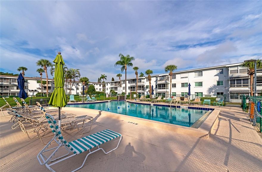 NEW PRICE!  TURNKEY FURNISHED top floor unit!  YES there is an ELEVATOR!  Enjoy the amazing Florida lifestyle at a price you can afford.  One bedroom, one bathroom, and comes with everything you need--just bring your toothbrush!  Relaxed living space with a full kitchen, dining, and living room, and a sitting room with a nice view of the courtyard & pool.  Bayshore Condominiums have long been regarded as one of the area's best places to live, and the tradition continues today!  Close to major shopping, dining, the airport, and world-renowned beaches.  Must be 55 or older and sorry, no pets.  Community pool, shuffleboard, and more.  Wonderful social activities abound, you will love living here--make it yours TODAY!