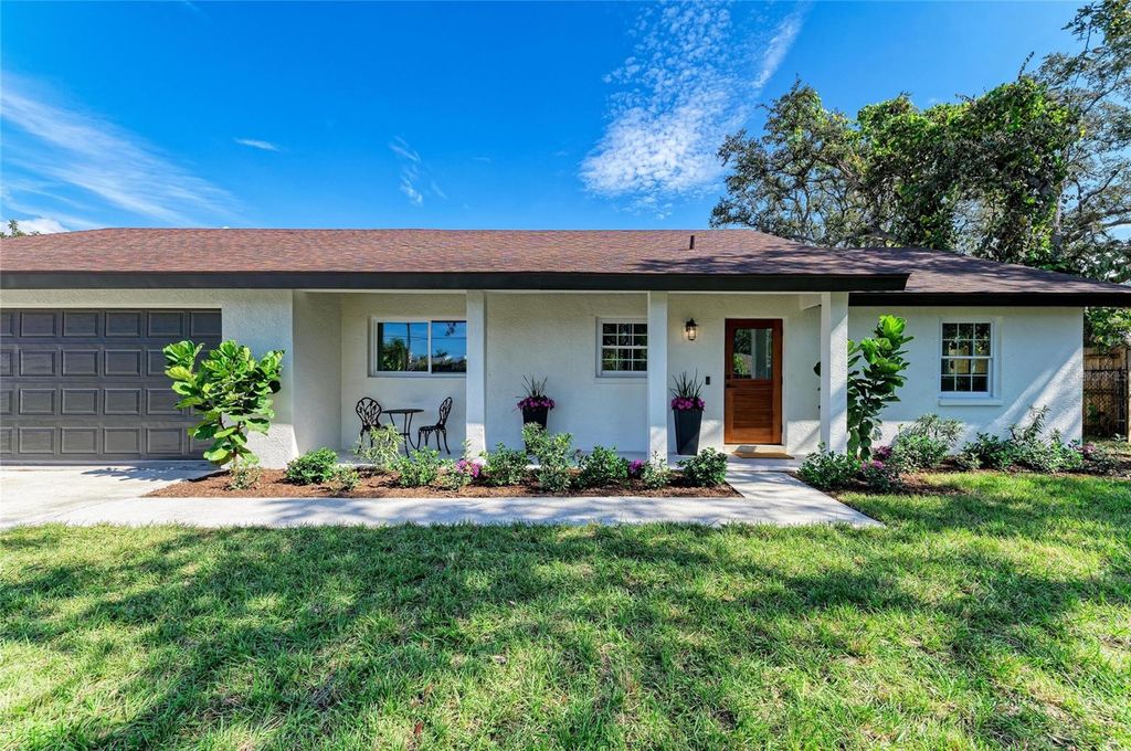 Photo of 8245 Longbay Boulevard, Sarasota, FL 34243 (MLS # A4670835)