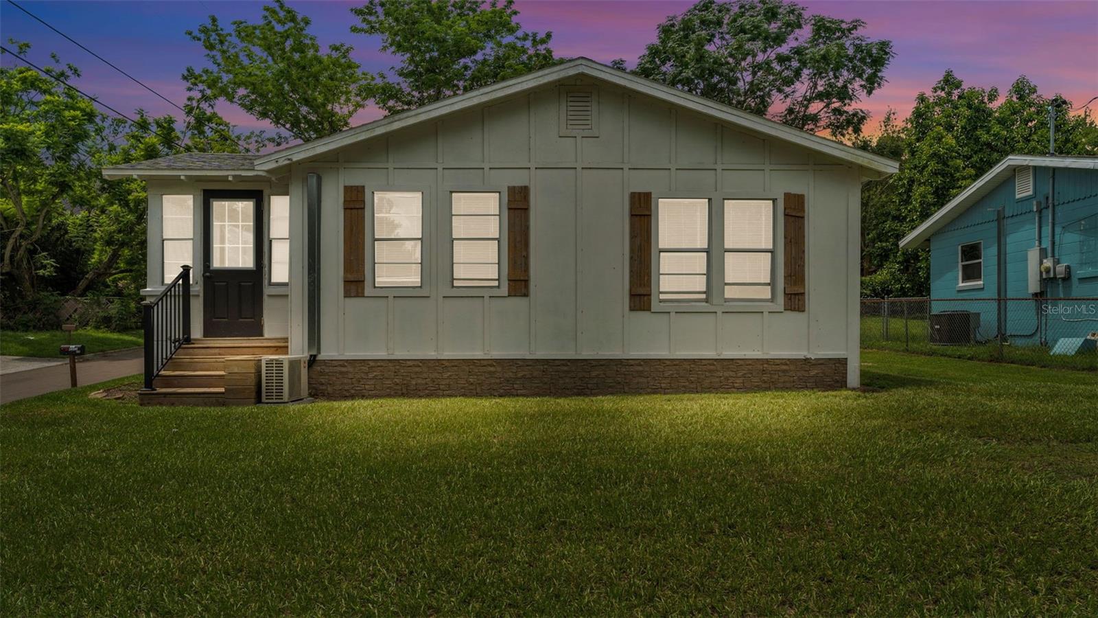 Welcome to the heart of Lake Whales, where you will find this recently remodeled home awaiting it's new owner! Whether your'e a first time home-buyer, downsizing, or looking for a solid investment, don't pass this one up. Inside you will notice fresh finishes throughout including paint, flooring, cabinetry, ect. The layout is cozy, yet functional offering an open flow in the main living area. Outside enjoy the spacious fenced in yard with weekend BBQ's or growing a garden. Off the back of the home is an over-sized screen room perfect for extra storage, entertaining, or expanding the living space. Move-in ready, affordable, and full of charm. Schedule your tour today!